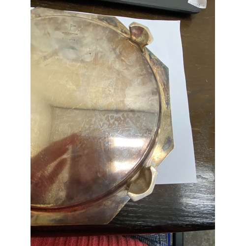 8 - An Art Deco silver salver, Walker & Hall Sheffield 1933, of octagonal form with decorative reed and ... 