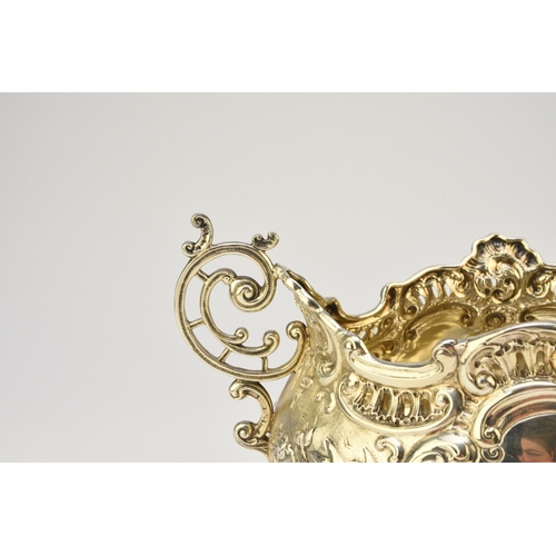 9 - A Victorian silver two handled dish, Albert Henry Thompson, Sheffield 1899, of oval form with emboss... 