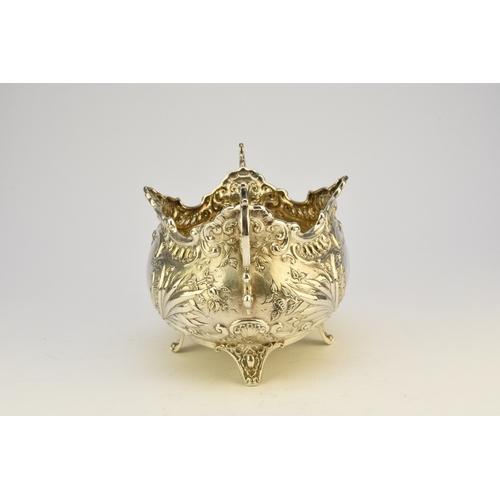 9 - A Victorian silver two handled dish, Albert Henry Thompson, Sheffield 1899, of oval form with emboss... 