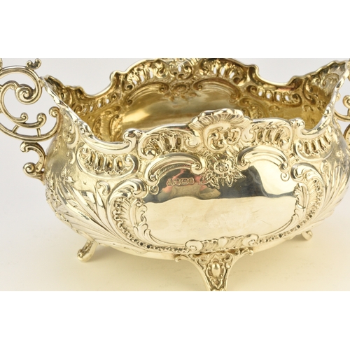 9 - A Victorian silver two handled dish, Albert Henry Thompson, Sheffield 1899, of oval form with emboss... 