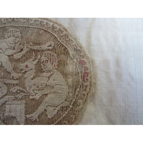 155 - A Coptic textile panel, 4th-6th century A.D. Of round form and woven with three figures and a beast ... 