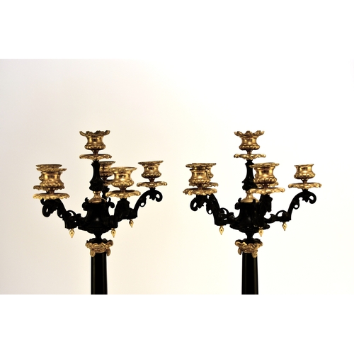 157 - A pair of bronze, ormolu and marble candelabra, late 19th century With five scroll branches having g... 