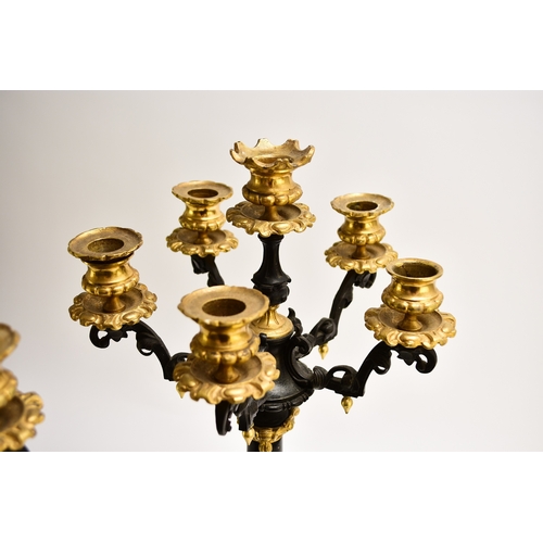 157 - A pair of bronze, ormolu and marble candelabra, late 19th century With five scroll branches having g... 