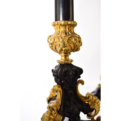 157 - A pair of bronze, ormolu and marble candelabra, late 19th century With five scroll branches having g... 