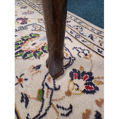 170 - A George III oak cross-banded dresser and rack The ogee cornice above four shelves, the lower flanke... 