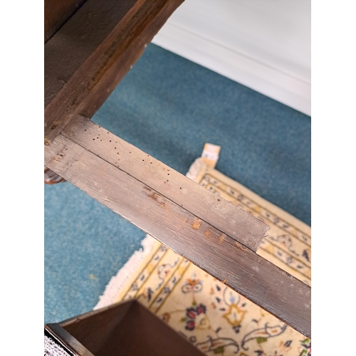 170 - A George III oak cross-banded dresser and rack The ogee cornice above four shelves, the lower flanke... 