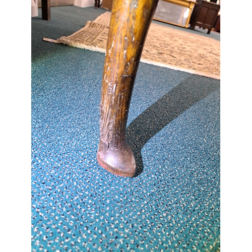 170 - A George III oak cross-banded dresser and rack The ogee cornice above four shelves, the lower flanke... 