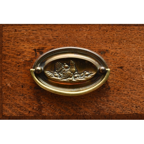 177 - A George III cross-banded oak dresser and rack, Shropshire The open rack with dentil cornice and scr... 