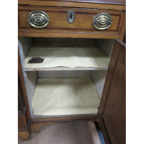 178 - A George III cross-banded oak break-front housekeeper's cupboard The reeded cornice above a mahogany... 