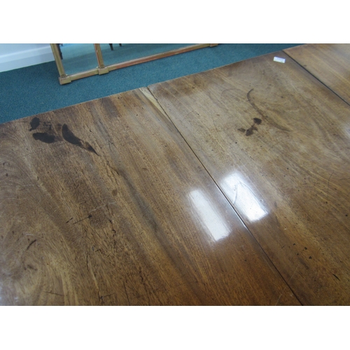 184 - A George III mahogany D-end extending dining table The top with reeded edge above a plain frieze, ra... 