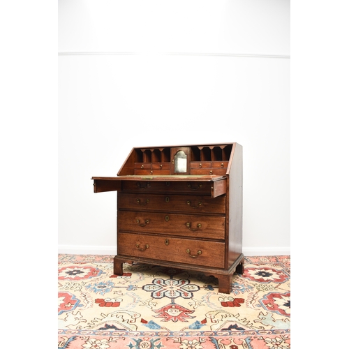 188 - A George III mahogany bureau The cross-banded fall front enclosing a fitted interior with six drawer... 