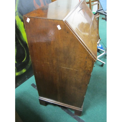 188 - A George III mahogany bureau The cross-banded fall front enclosing a fitted interior with six drawer... 