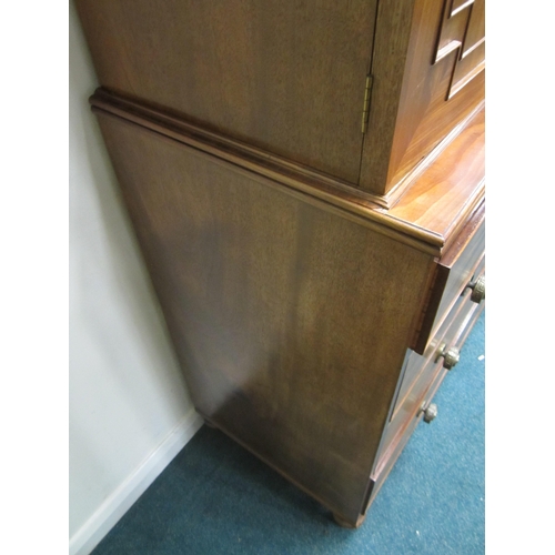 189 - A George III mahogany linen press The cavetto cornice above twin doors with fielded panels, enclosin... 