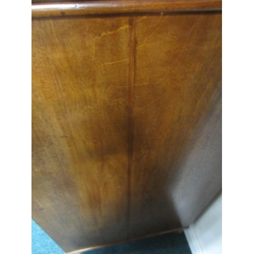 189 - A George III mahogany linen press The cavetto cornice above twin doors with fielded panels, enclosin... 