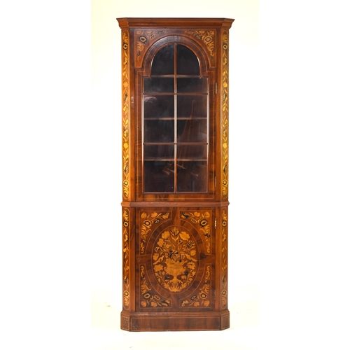 197 - A reproduction Dutch marquetry standing corner cabinet The upper section with ogee cornice above an ... 
