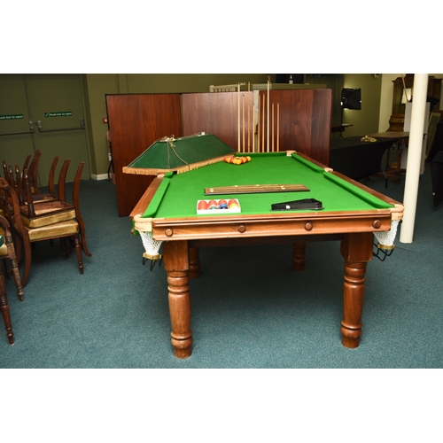 201 - A standard 8ft billiards table, late 20th century By A & D Billiards, in mahogany with slate bed and... 