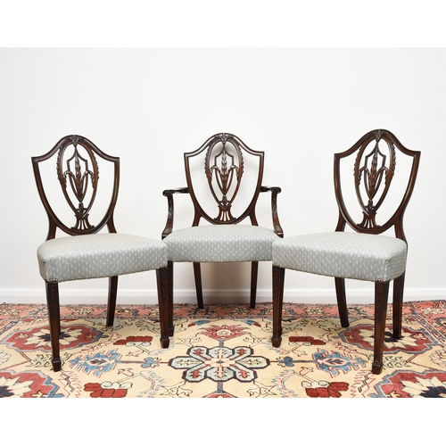 207 - A set of ten mahogany dining chairs in the Hepplewhite style Late 19th/early 20th century, including... 