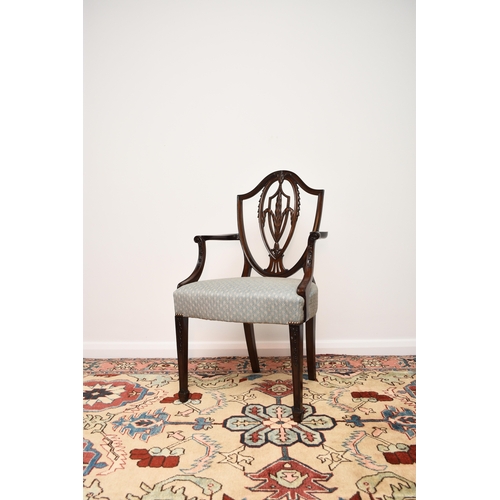 207 - A set of ten mahogany dining chairs in the Hepplewhite style Late 19th/early 20th century, including... 