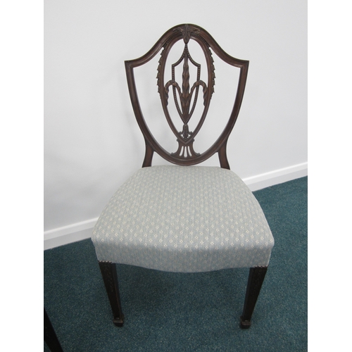 207 - A set of ten mahogany dining chairs in the Hepplewhite style Late 19th/early 20th century, including... 