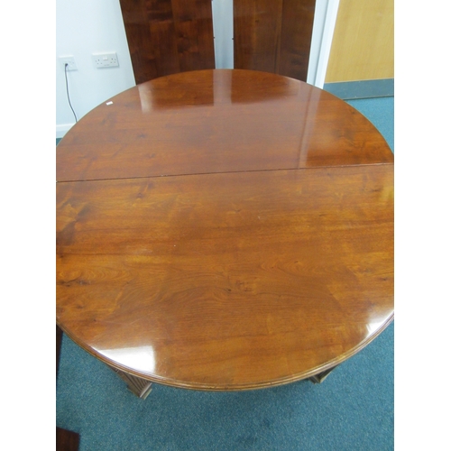 208 - A reproduction mahogany wind-out extending dining table, circa 1920s The moulded D-end top above a b... 