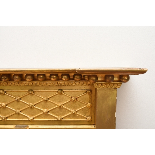 211 - A 19th century Regency style three-glass overmantel mirror The deep cornice applied with balls above... 