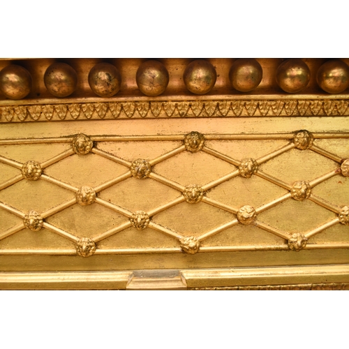 211 - A 19th century Regency style three-glass overmantel mirror The deep cornice applied with balls above... 