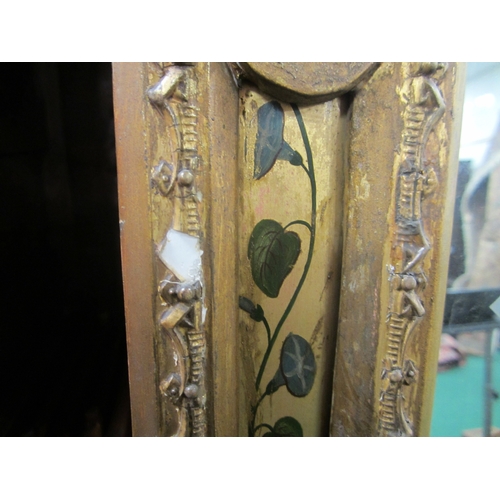215 - A 19th century giltwood and painted Renaissance style overmantel mirror The near square plate within... 