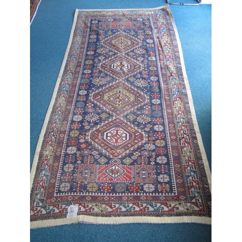 217 - A Qashqai kelim rug, first half 20th century 277cm x 137cm Condition:Wear to all four edges. Wear to... 