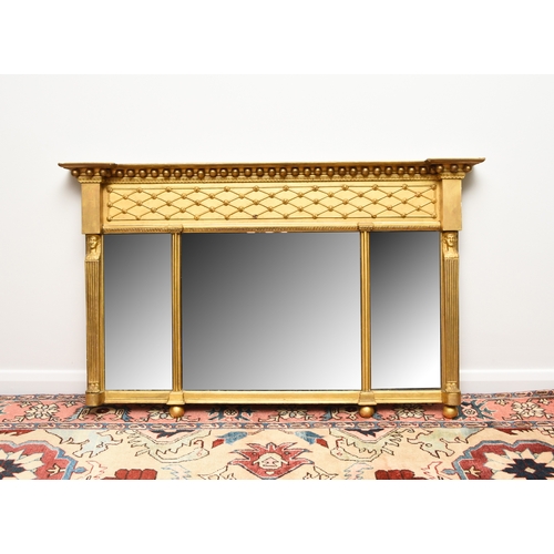 211 - A 19th century Regency style three-glass overmantel mirror The deep cornice applied with balls above... 