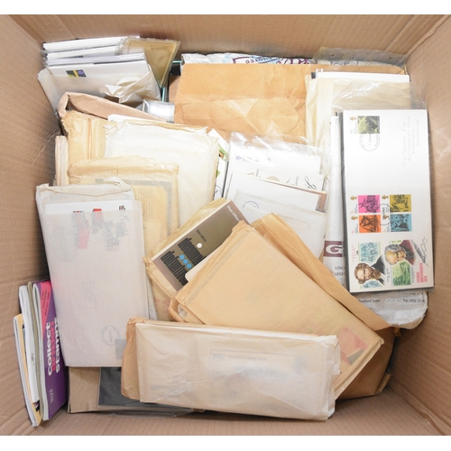 138 - Two large cartons containing a massive accumulation of covers, stamps, FDCs, presentation packs, boo... 