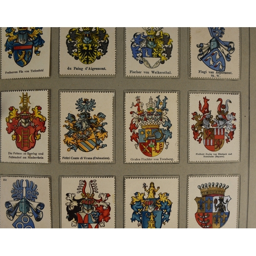 143 - Two albums containing 1890-1910 period poster stamps showing crests on white card (Wappen vershnetto... 