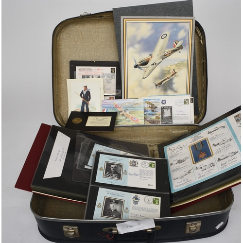 150 - Large accumulation of military related stamps on covers in 2 suitcases. 2 burgundy albums filled wit... 