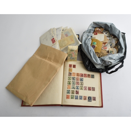 154 - Large accumulation of stamps in a box: stamps on pages in tins, in bag, in binders. Large red stock ... 