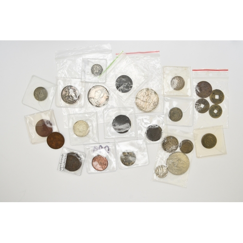 236 - An album containing approximately 75 Silver, Copper and Bronze world coinage from Greek, Roman, Engl... 