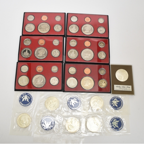 243 - United States coinage comprising six 1976 proof sets in cases and Seven 1974-1975 US mint uncirculat... 