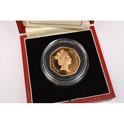 290 - Royal Mint 1992-1993 gold proof fifty pence coin within capsule, fitted case and with certificate of... 