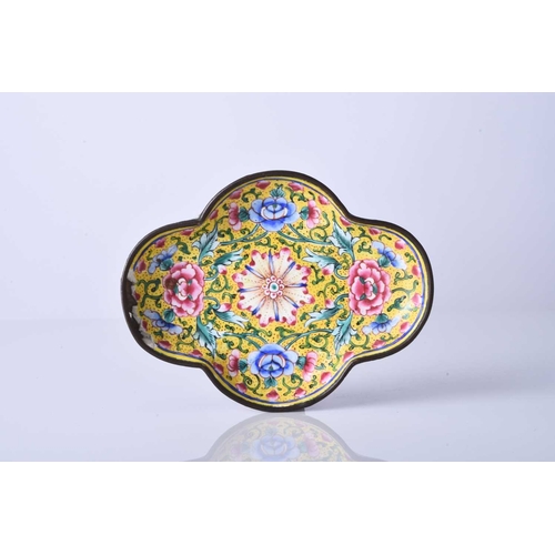 100 - A group of Chinese enamel dishes, 18th century and later Of quatrelobed form, four decorated with fi... 