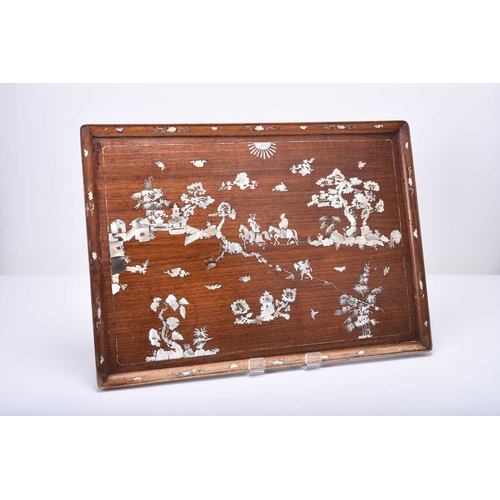 119 - A Chinese mother-of-pearl inlaid rosewood rectangular tray, Qing Dynasty Decorated with a scene of a... 