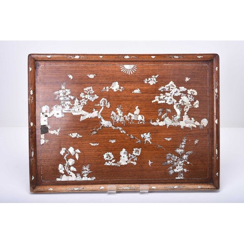 119 - A Chinese mother-of-pearl inlaid rosewood rectangular tray, Qing Dynasty Decorated with a scene of a... 