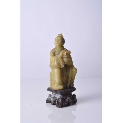 128 - A Chinese carved soapstone figure of a luohan, 19th century 10.5cm high