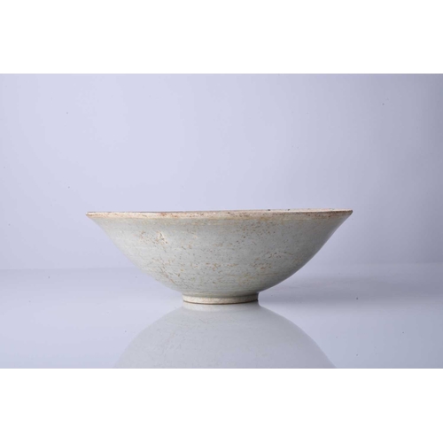 13 - A Chinese qingbai bowl, Song Dynasty Of conical form, the interior with combed decoration of stylise... 