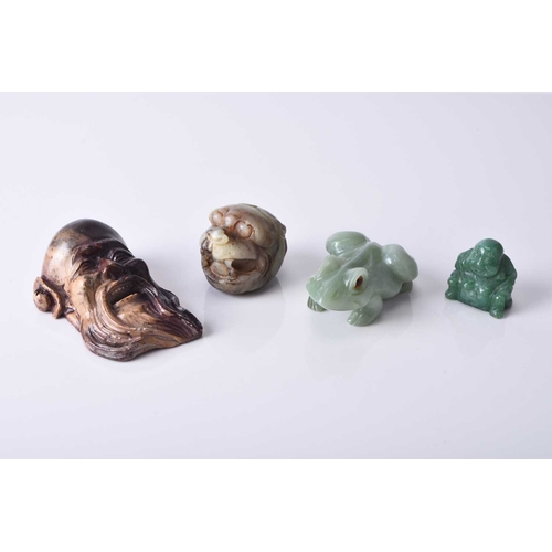 130 - An assembled group of Chinese hardstone carvings, Qing Dynasty/Republic period Including: a mask of ... 