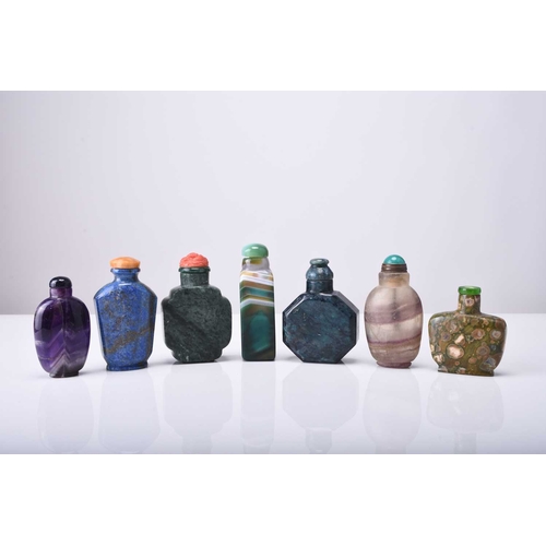 137 - A group of Chinese hardstone snuff bottles, 19th/20th century Including amethyst, banded agate, lapi... 