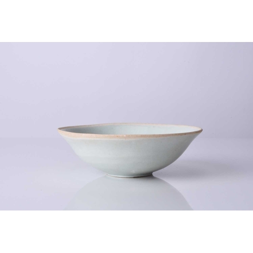 14 - A Chinese small qingbai bowl, Song Dynasty Of conical form and covered in a pale blue-green glaze st... 