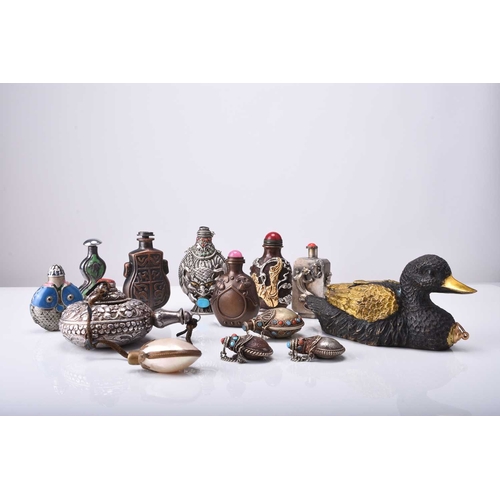 143 - A group of Chinese metal snuff bottles, 20th century Including embossed copper, embossed silver, ena... 