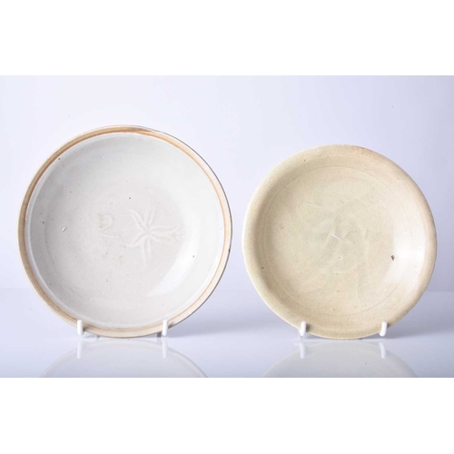 15 - Two Chinese Qingbai bowls, Song/Yuan Dynasty The first of shallow rounded form, the inside carved wi... 