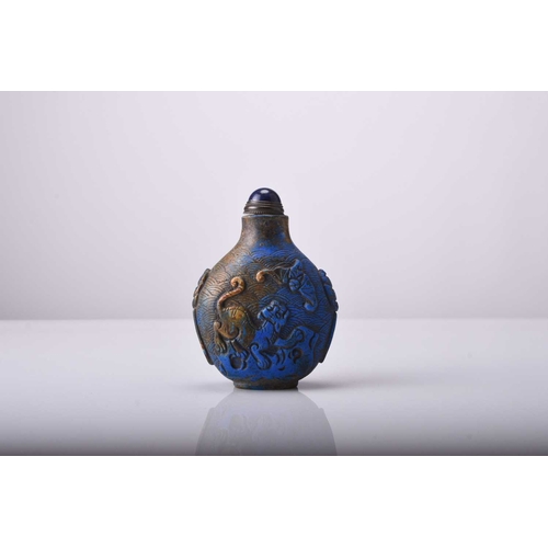 150 - A Chinese carved lapis lazuli snuff bottle, Qianlong seal mark but 19th century Of ovoid form and ca... 