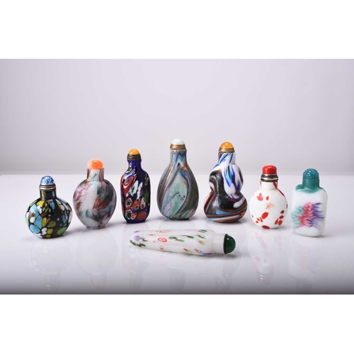 151 - A group of eight Chinese glass snuff bottles, 19th/20th century Seven of ovoid form and one of gourd... 