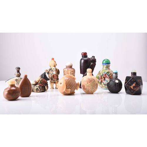 153 - A group of Chinese snuff bottles, 19th/20th century Of various materials including bone, nut kernel,... 