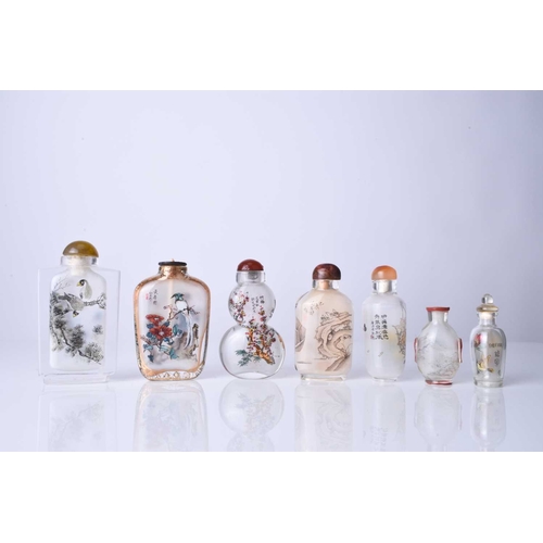 169 - A group of seven Chinese internally painted glass snuff bottles, 20th century Of varying form, each ... 